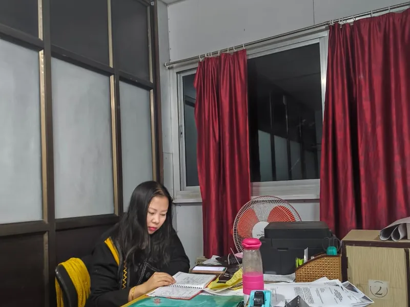 An Eartheners team member handling customer enquiries at the Imphal office