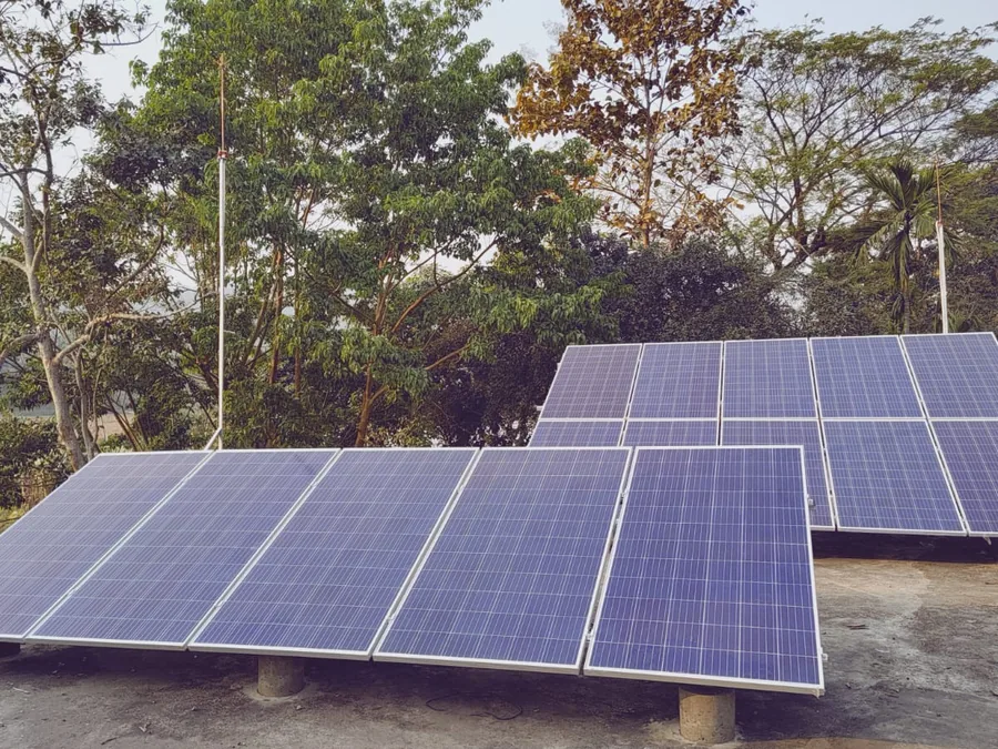 Ground-mounted off-grid solar array serving a community in the hills of Manipur