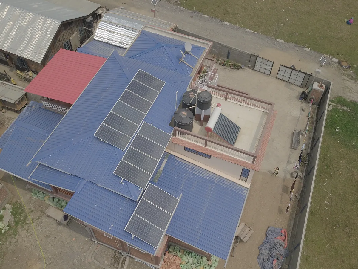 Aerial view of a grid-connected rooftop solar installation in Imphal, Manipur